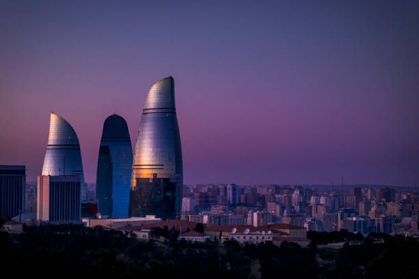 Flame Towers in Baku at dusk. stock photo