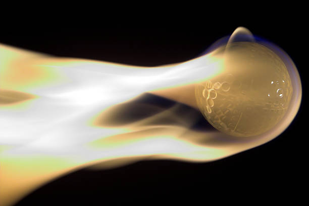 Flaming Golf Ball A flaming golf ball rocketing through space. reentry stock pictures, royalty-free photos & images