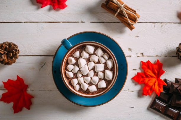 Flat Lay Homemade Hot Chocolate Served With Marshmallows Homemade Hot Chocolate Served With Marshmallows on Wooden Table marshmallow stock pictures, royalty-free photos & images