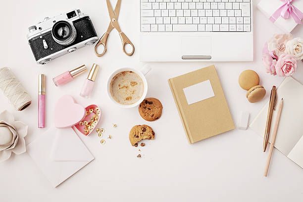 flat lay notebook and office accessories stock photo