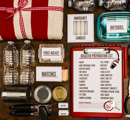 Flat lay of a collection of items for disaster preparedness and emergency planning