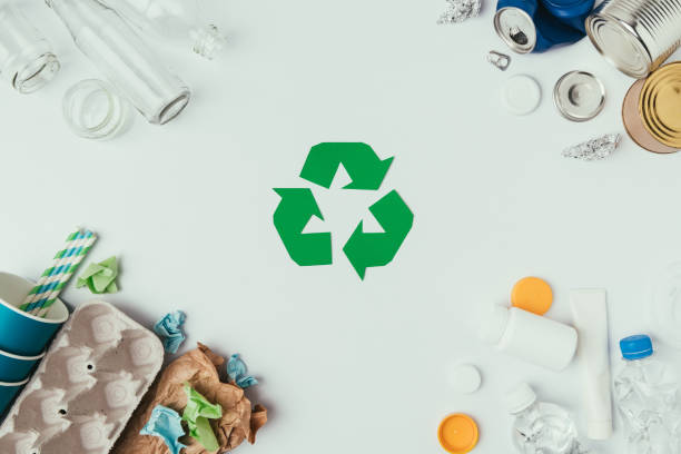flat lay with arranged different types of garbage and recycle sign isolated on grey flat lay with arranged different types of garbage and recycle sign isolated on grey Types of Recycling stock pictures, royalty-free photos & images