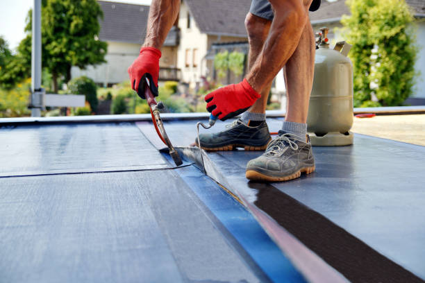 Flat roof installation with propane blowtorch during construction works with roofing felt. Heating and melting bitumen roofing felt. Roofing felt. Roofer working. Roofer working tool. Waterproofing flat physical description stock pictures, royalty-free photos & images