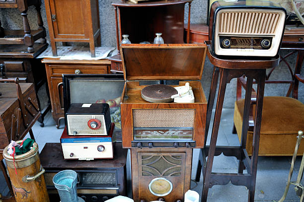 Flea market and radio equipment. Flea market stall with obsolete radio equipment and record player. flea market photos stock pictures, royalty-free photos & images