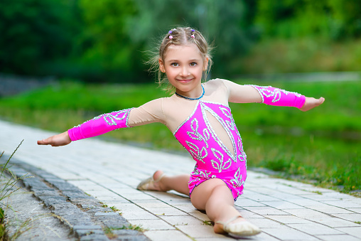 Flexible Little Girl Doing Gymnastics Split Stock Photo 