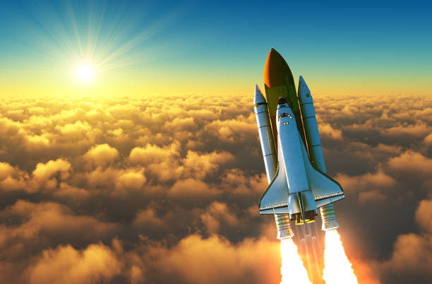 Flight Of The Space Shuttle Above The Clouds In The Rays Of The Rising Sun. stock photo
