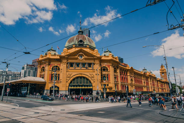 Flinders Street Station - Melbourne, Australia Daytime, landscape shot of Flinders Street Station in the Central Business District of Melbourne, Australia. federation square stock pictures, royalty-free photos & images