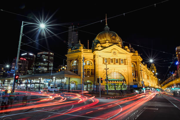 Flinders Street Station - Melbourne, Australia Long exposure Flinders Street Station - Melbourne, Australia shot at night. federation square stock pictures, royalty-free photos & images