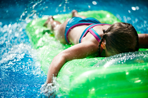 Floating In The Pool Stock Photo - Download Image Now - iStock