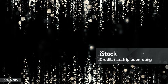 istock floating silver bokeh black background silver stardust 3D illustration 1336927859