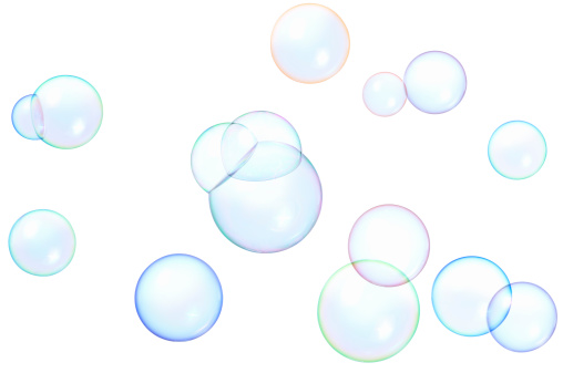 photographed floating soap bubbles isolated on pure white. clipping path included.