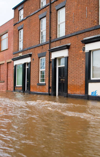 Flood in front of a brick building stock photo