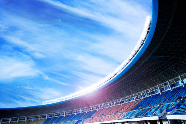 flutlicht in einem leeren stadion in china - stadium soccer seats stock-fotos und bilder