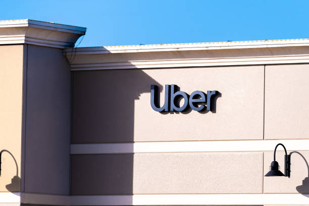 Florida city with entrance sign to building for Uber business company office for greenlight stock photo