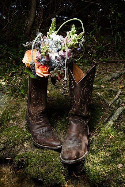 Flower Bouqet in Boots stock photo