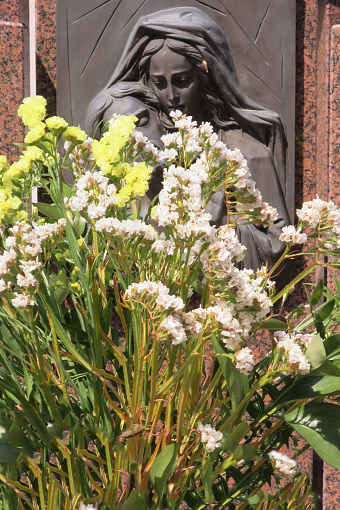 flowers with gravestones cemetery