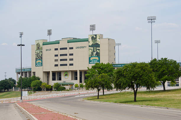 Floyd Casey Field at Baylor University Waco, United States - September 27, 2015: Floyd Casey Field is now the old football stadium for Baylor University.  It has been replaced by an amazing new stadium built on the Brazos River closer to campus, McLane Stadium.  Floyd Casey is decorated with Baylor sports stars and coaches that have put the university's athletic prowess on the map.  You'll find Robert Griffin III, Mike Singletary, and football coaches Grant Teaff and Art Briles represented on the exterior of the stadium. baylor football stock pictures, royalty-free photos & images