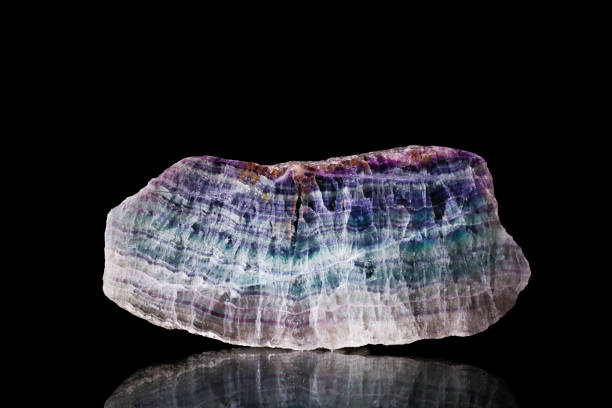 Fluorite slice on black backgroungd isolated Fluorite slice on black backgroungd isolated fluorite rainbow stock pictures, royalty-free photos & images