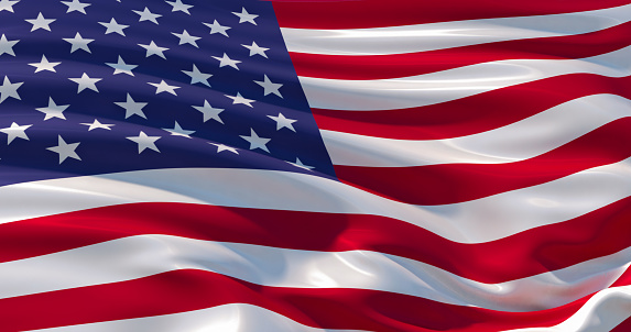 Fluttering silk flag of United States of America. Old Glory in the wind, colorful background