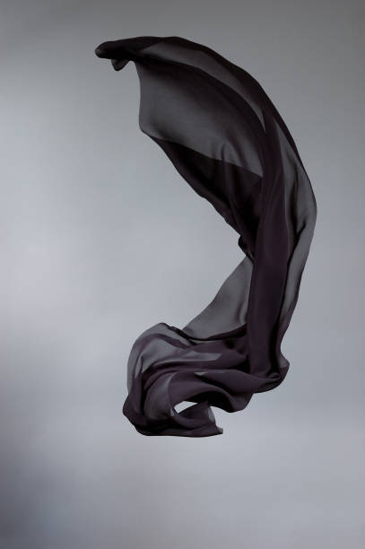 flying black silk - black fabric stockfoto's en -beelden