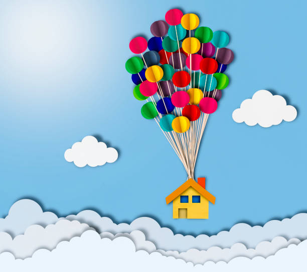 Flying house over clouds, paper cutting style stock photo
