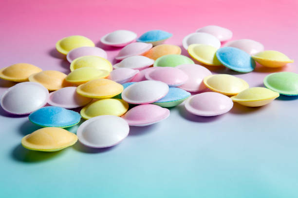 flying saucer multi coloured candy stock photo