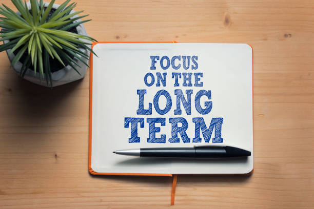 Focus on the long term Focus on the long term motivational quote long stock pictures, royalty-free photos & images