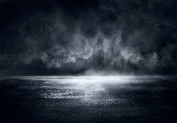 nebel auf zement mit defokussiertem rauch in halloween dark background - romolotavani stock-fotos und bilder