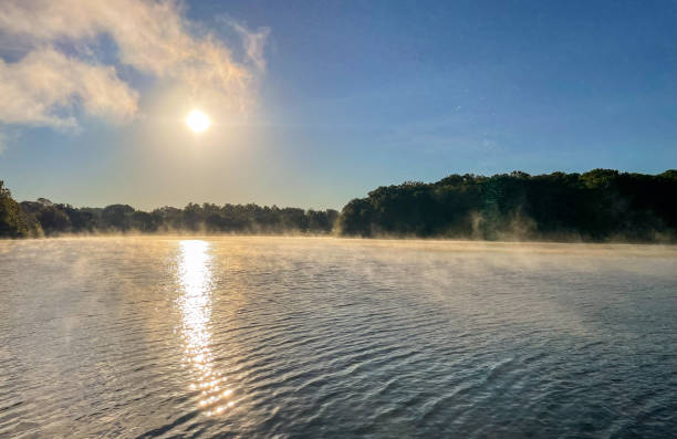 Fog over the Shawnee Mission Lake stock photo