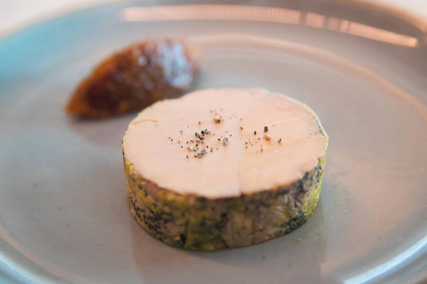 Foie Gras on a flat Appetizer plate of fresh Foie Gras foie gras stock pictures, royalty-free photos & images