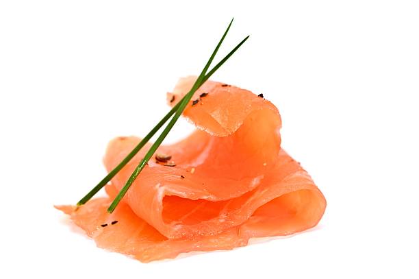 Folded up salmon sashimi with light seasonings  Fresh Cold Smoked Salmon smoked salmon photos stock pictures, royalty-free photos & images