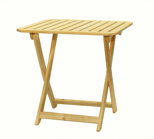 Folding wooden table on a white background stock photo