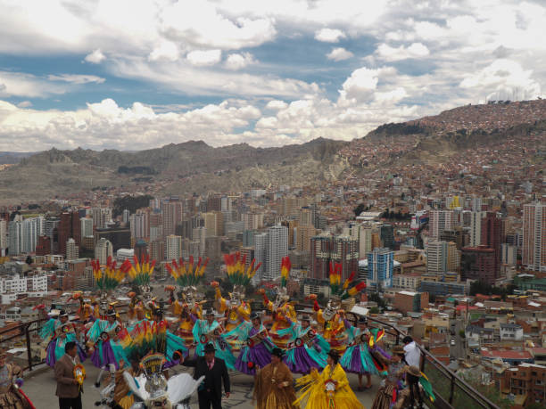 Folkore dance with view over La Paz, Bolivia stock photo