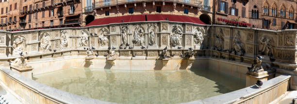 Fonte Gaia monumental fountain at the Piazza del Campo square in Siena city, Tuscany, Italy stock photo