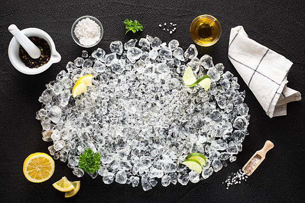 Food ingredients  and crushed ice on black table stock photo
