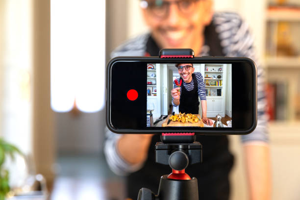 Food Vlogger Recording Live Streaming Food Vlogger Recording Live Streaming For Cooking Class Online blogging photos stock pictures, royalty-free photos & images