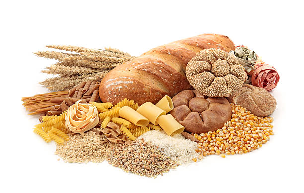 Foods high in carbohydrate Foods high in carbohydrate, isolated on white 7 grain bread photos stock pictures, royalty-free photos & images