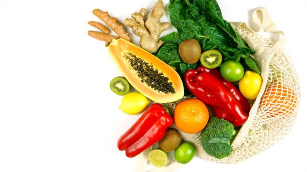 foods that boost the immune system including fruit, vegetables and poultry. - alimentos sistema imunitário imagens e fotografias de stock