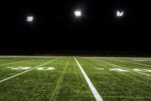 Football Field At Night Stock Photo - Download Image Now - iStock