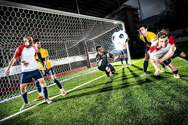 Football match in stadium: Header goal Football match in stadium: Header goal soccer striker stock pictures, royalty-free photos & images