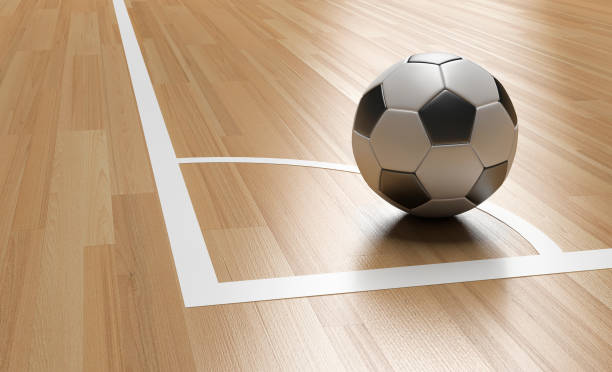 football on wooden court floor corner - futsal imagens e fotografias de stock
