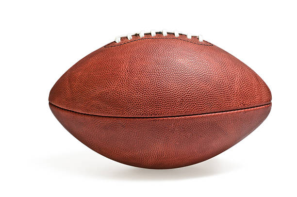 NFL Football Regulation Official NFL Football with all logos removed on a white backgroundsee also: american football sport stock pictures, royalty-free photos & images