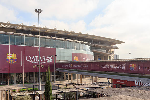 Football stadium Camp Nou outside in Barcelona Barcelona, Spain - November 12, 2015: Football stadium Camp Nou outside. The stadium has been the home of FC Barcelona since its completion in 1957. With a seating capacity of 99354 it is the largest stadium in Spain and Europe by capacity. barca stock pictures, royalty-free photos & images