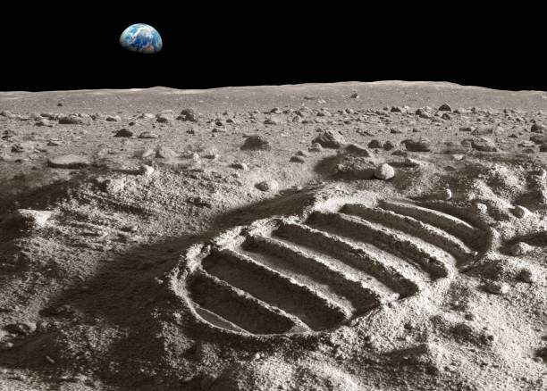 Footprint of astronaut on the moon Footprint of astronaut on the moon with earth above the horizon. Photo of the earth has been used with courtesy of NASA database. Photo of the moon surface and the footprint has been created in the studio. moon photos stock pictures, royalty-free photos & images