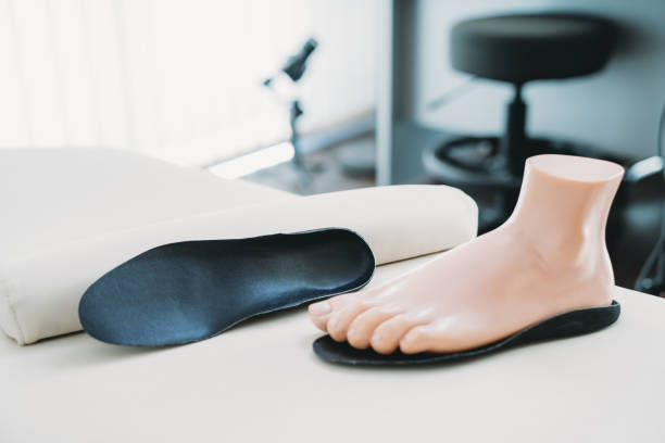 Footprints with mannequin feet - Podiatry concept stock photo