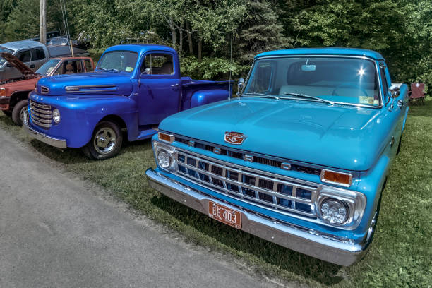 1964 Ford F100 and 1947 Ford F47 pickup trucks stock photo