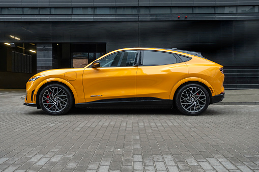 Berlin, Germany - 5th January, 2022: Electric SUV Ford Mustang Mach-E GT stopped on a street. This model is the first mass-produced electric SUV from Ford.