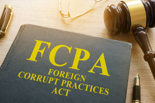 fcpa extranjeros ley de prácticas corruptas en un escritorio. - practicar fotografías e imágenes de stock