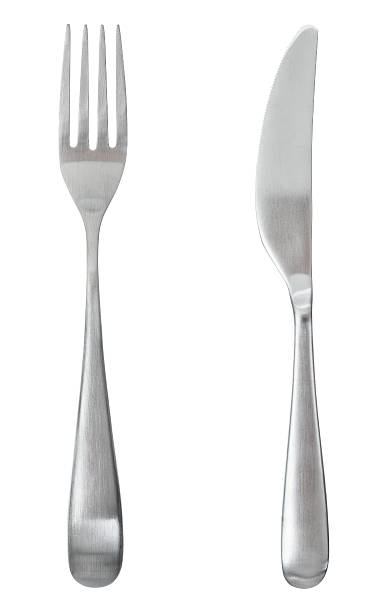 Fork and knife Fork and knife isolated on white aluxum stock pictures, royalty-free photos & images