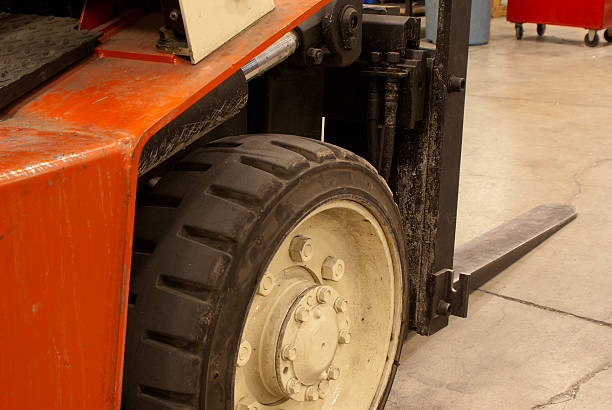 Forklift Tire and Fork stock photo